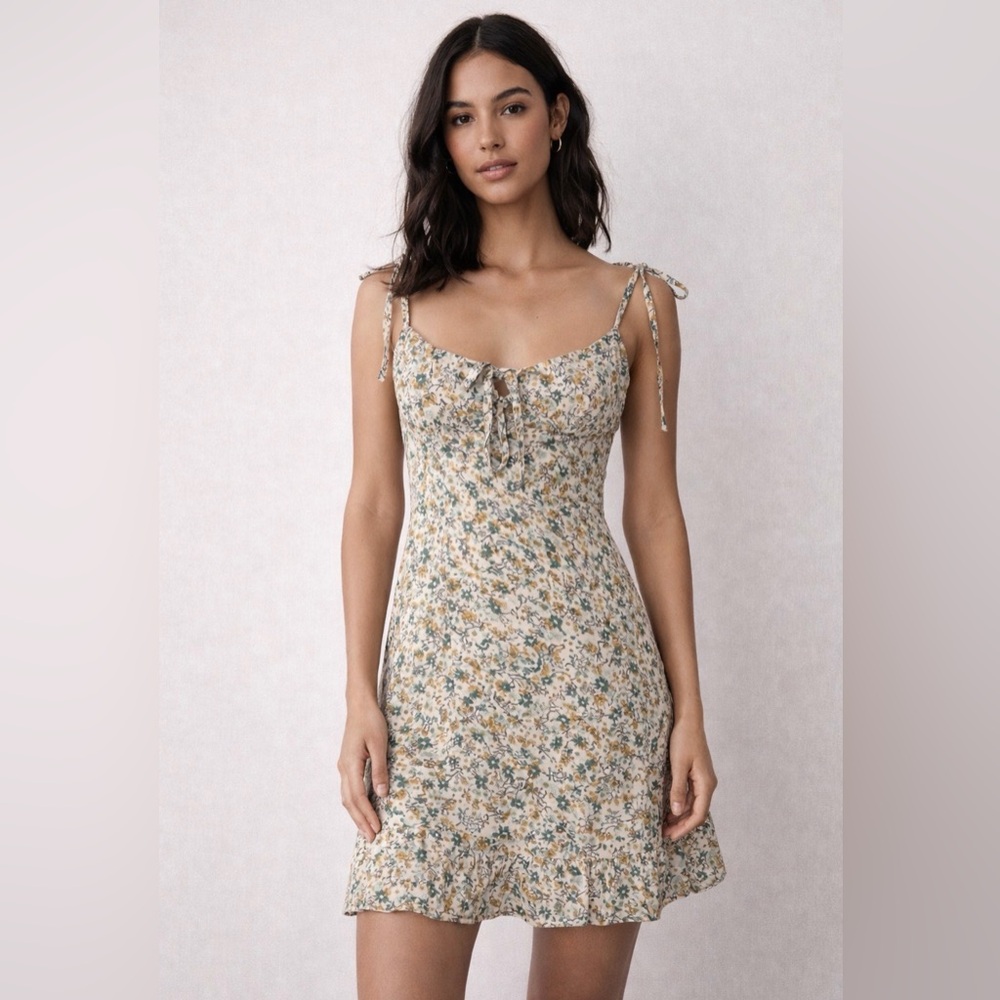 ditsy floral mini dress with tie-shoulder straps and a ruched bust milkmaid Y2K